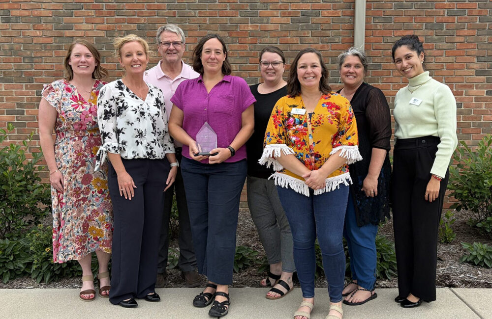group of community leaders, including Kate Knaul